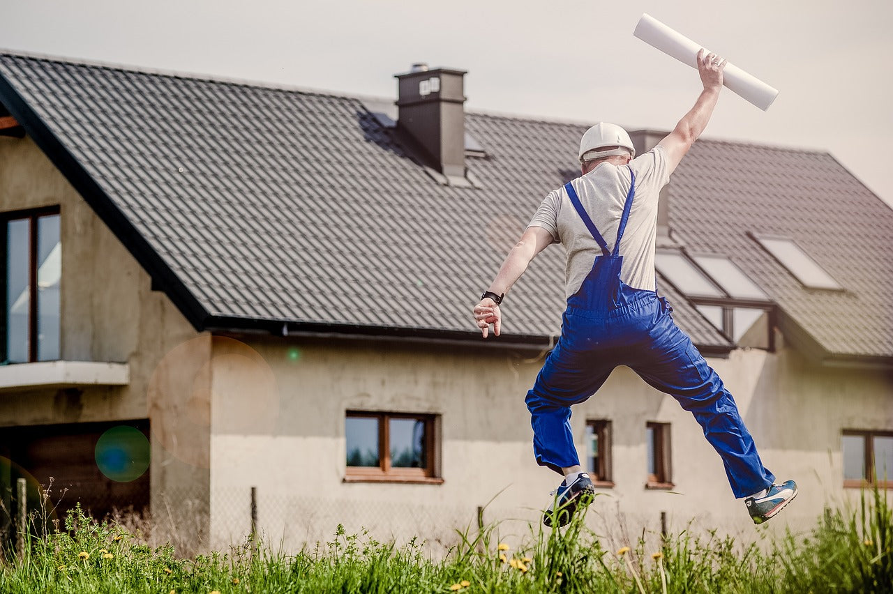 Construction worker running to finish job